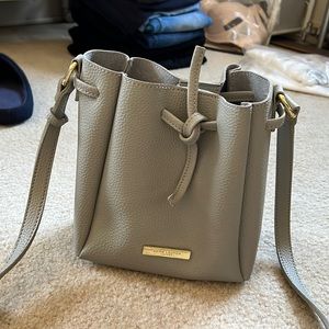 Grey small bucket crossbody bag